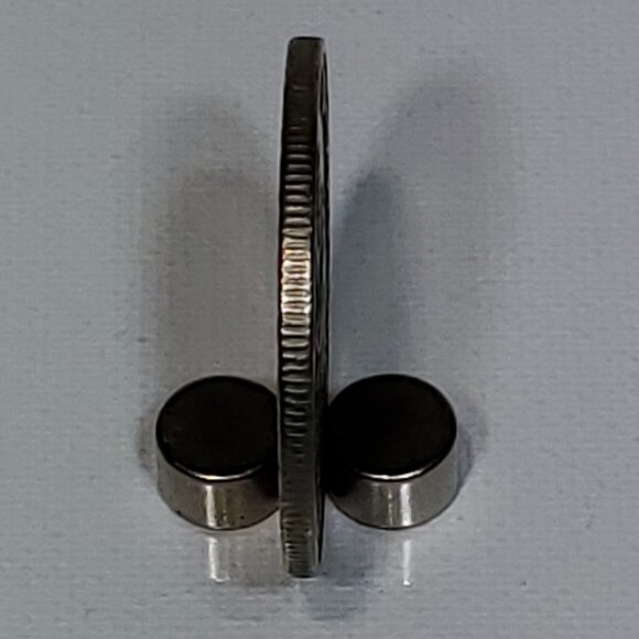 VINTAGE MIRAGE CASINO SILVER ONE DOLLAR GAMING TOKEN 1989 BY NEVADA COIN MINTING - Picture 3 of 4